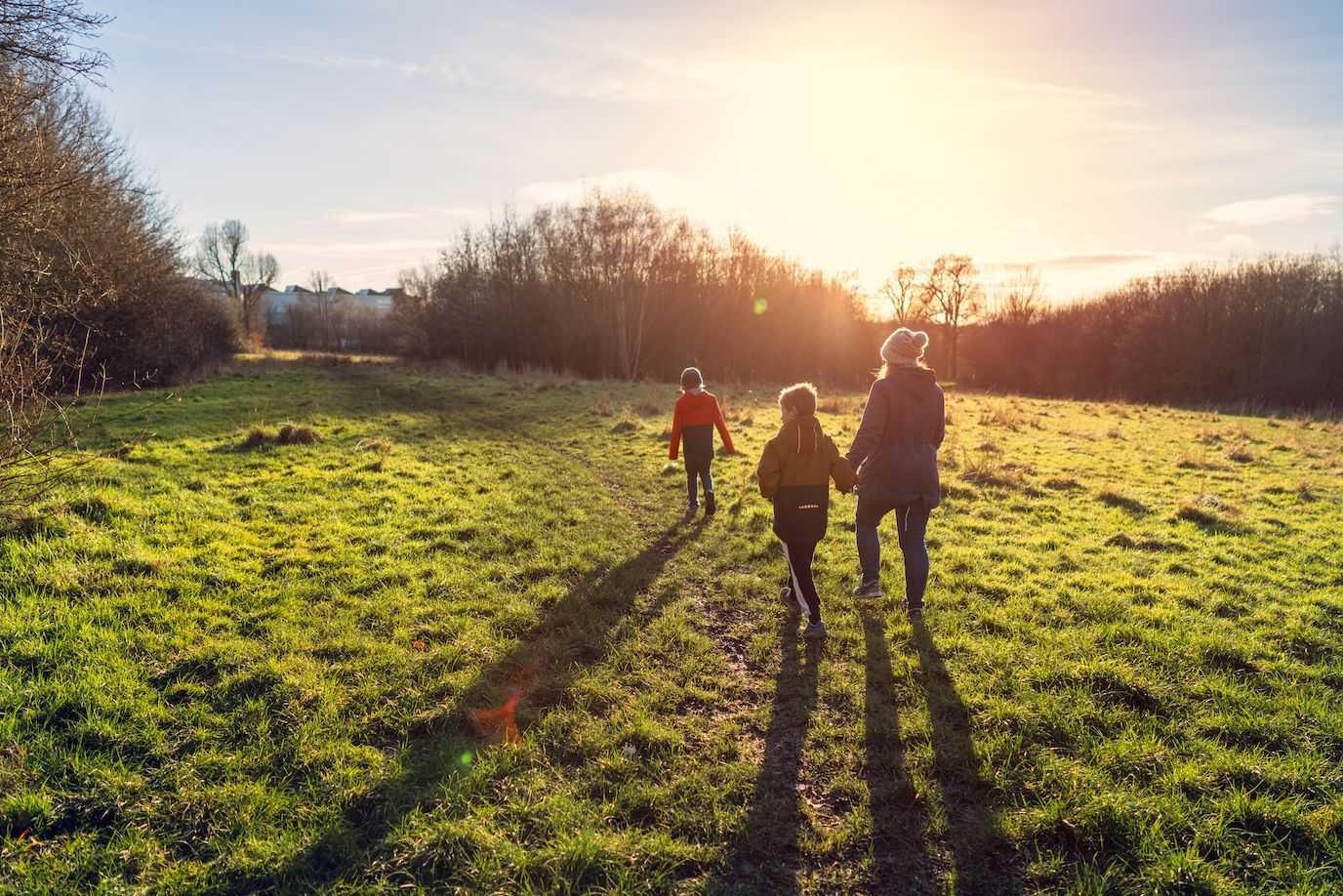 Family walking in Uttlesford countryside